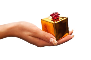 Gold gift box in woman's hand