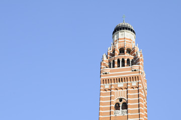 Fototapeta na wymiar church tower against blue sky