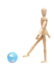 Wooden doll kicks planet