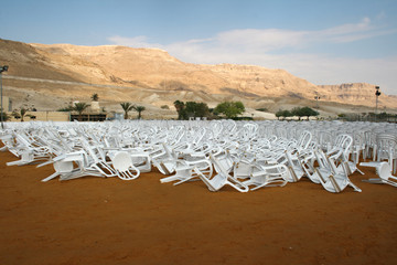 Plastic chairs on the beach