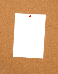 Bulletin board with empty white sheet of paper