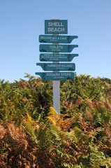 Signpost on beach on Herm