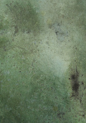 close view of green blue worn bronze