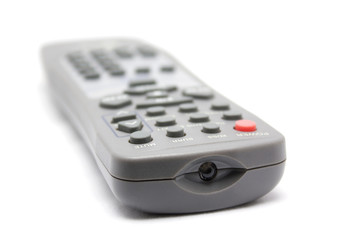 TV remote control. Selective focus limited to front objects.