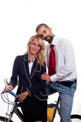 Fototapeta premium Young Businessman and Businesswoman on a Bike