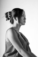 Calm black and white portrait of a young beautiful woman