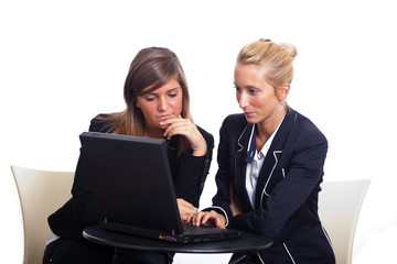 Two Young Businesswoman with Laptop