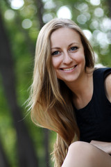 Closeup portrait of a happy young woman