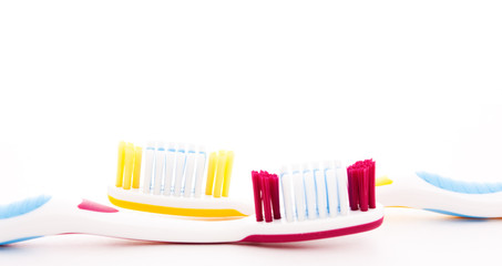 red and yellow toothbrush