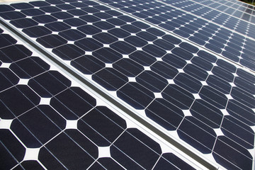 Closeup of solar panel cells mounted on roof top.