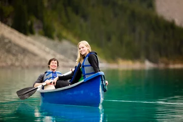 Foto op Canvas Couple Canoeing and Relaxing © Tyler Olson