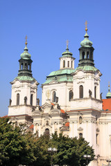 Fototapeta na wymiar Baroque St. Nicholas' Cathedral on the Oldtown Square in Prague