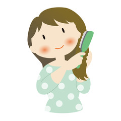 ヘアケア──髪をとかす女性