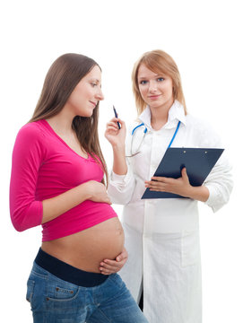 Pregnant woman consulting from doctor