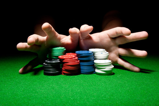 All In (Male Hands Pushing Poker Chips)