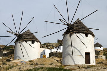 windmill Ios Island Cyclades Greece with thatch roof and white s