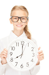 girl holding big clock