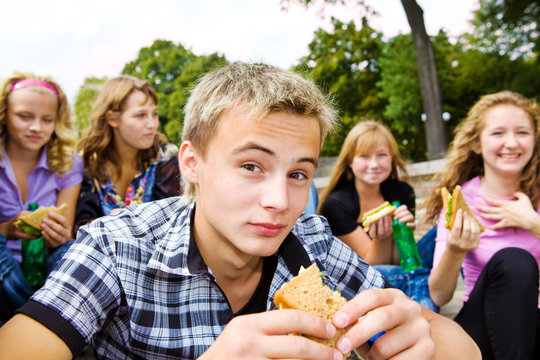 Teenagers with take-away food