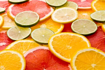 Foto op Plexiglas gesneden citrusvruchten © Igor Klimov
