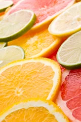 Foto op Plexiglas gesneden citrusvruchten © Igor Klimov
