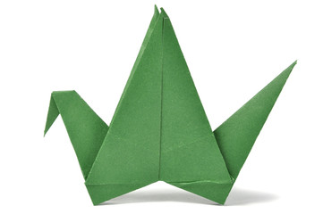 Origami crane over white