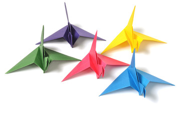 Origami cranes over white