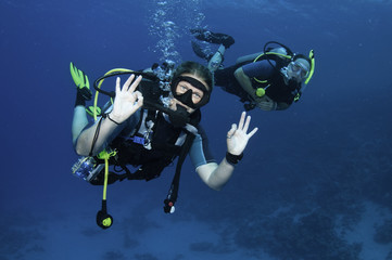 happy scuba divers