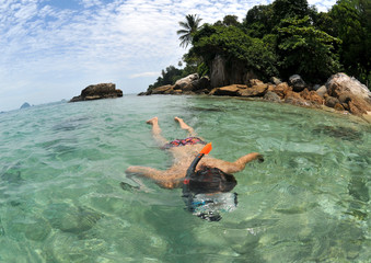 snorkeling at tropical dream beach