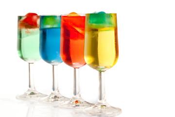 Four different coloured drinks