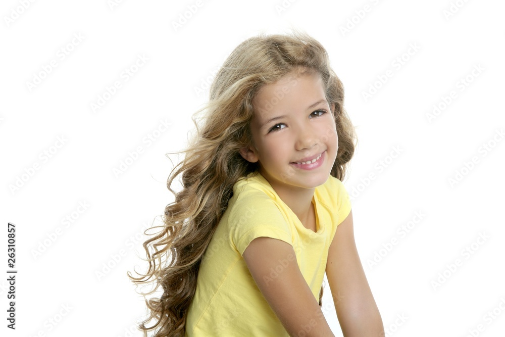 Wall mural little blond girl smiling portrait yellow tshirt isolated on whi