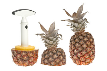 Whole and split pineapple with cutter