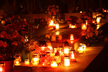 Candles burning at a cemetery