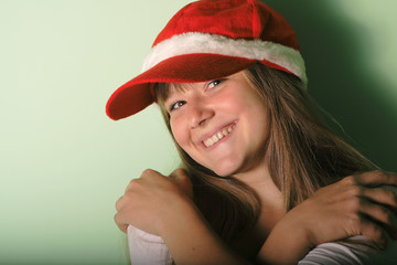 girl with Santa's red cap