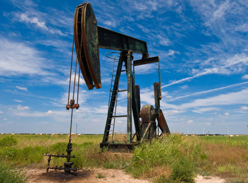 Pump jack in a field