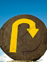 Wooden U turn sign