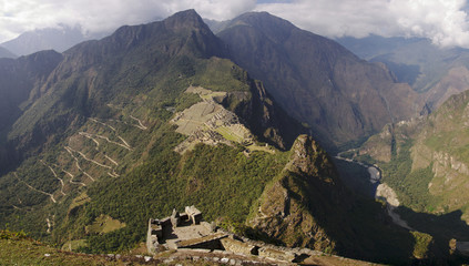 Machu Picchu and mountains seen from Wayna Picchu ruins