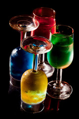 Two up, two down, drinks against black