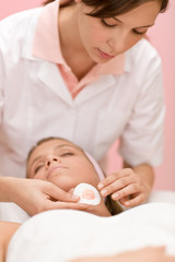Fototapeta na wymiar Luxury facial care - woman in spa salon