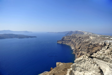 Fototapeta na wymiar Gorgeous view of romantic Santorini's coast. Greece.