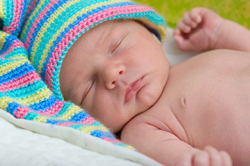 Baby sleeps on the towel