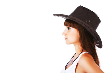 Charming girl in cowboy hat