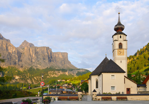 The Colfosco church and village, in italian Alps