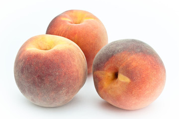 Peaches on a white background
