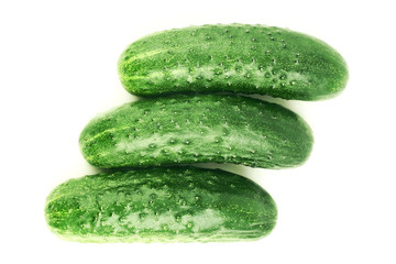 Three ripe cucumbers