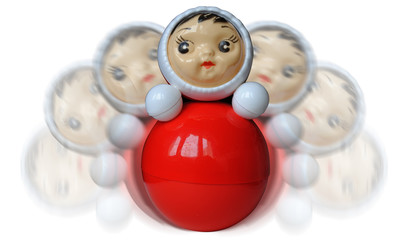 Wobbling roly-poly toy on white