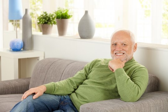Portrait of pensioner on couch