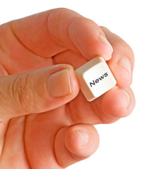 Hand with key for news