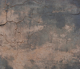 worn pink gray wall with cracks