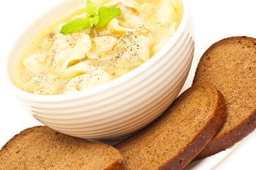 Pelmeni - traditional russian meat dumpling soup isolated