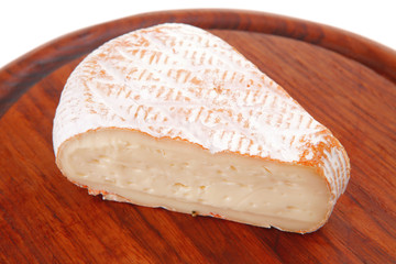 image of cheese on wood